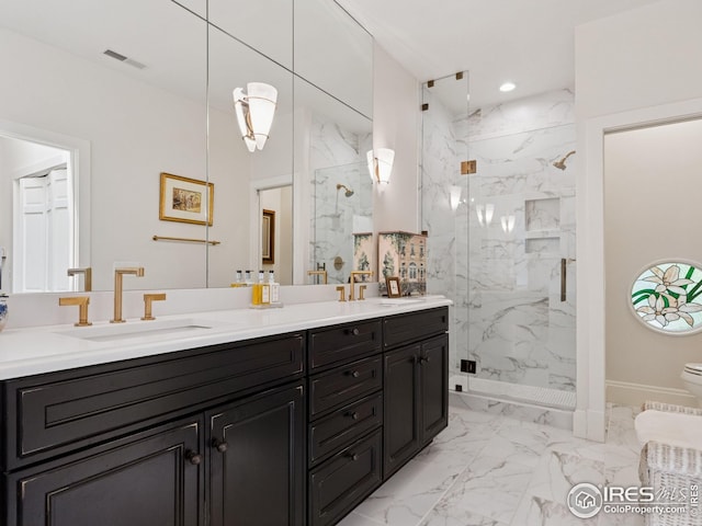 8000 N 41st St, Longmont, CO 80503 - bathroom featuring marble look tiles, a marble finish shower, double vanity, and recessed lighting