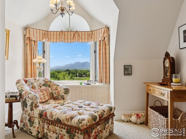 8000 N 41st St, Longmont, CO 80503 - sitting room featuring vaulted ceiling, carpet floors, and a mountain view