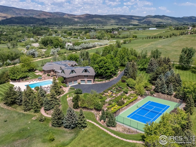 8000 N 41st St, Longmont, CO 80503 - aerial view of a mountain backdrop and a pool area