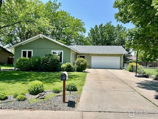 1722 Pheasant Rdg, Sterling, CO 80751 - view of front of home with a garage and concrete driveway