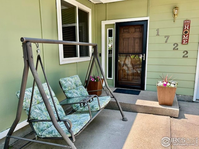 1722 Pheasant Rdg, Sterling, CO 80751 - property entrance featuring a porch