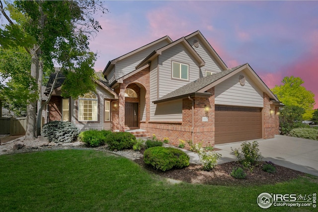 3514 Copper Spring Dr, Fort Collins, CO 80528 - traditional-style house featuring brick siding, concrete driveway, and an attached garage