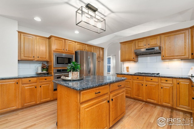 3514 Copper Spring Dr, Fort Collins, CO 80528 - kitchen with appliances with stainless steel finishes, under cabinet range hood, light wood-style floors, backsplash, and recessed lighting