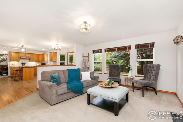 3514 Copper Spring Dr, Fort Collins, CO 80528 - living area featuring a chandelier and light carpet