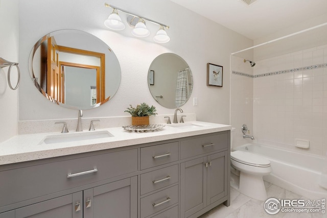 3514 Copper Spring Dr, Fort Collins, CO 80528 - bathroom featuring double vanity, shower / tub combination, and marble look tiles