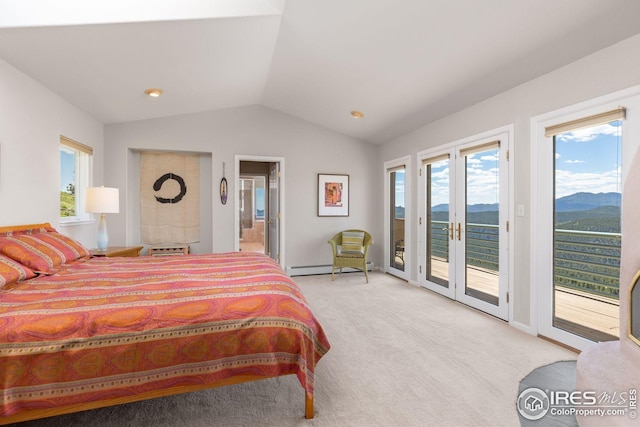 606 Sugarloaf Mountain Rd, Boulder, CO 80302 - carpeted bedroom featuring lofted ceiling, access to exterior, a baseboard heating unit, connected bathroom, and a mountain view