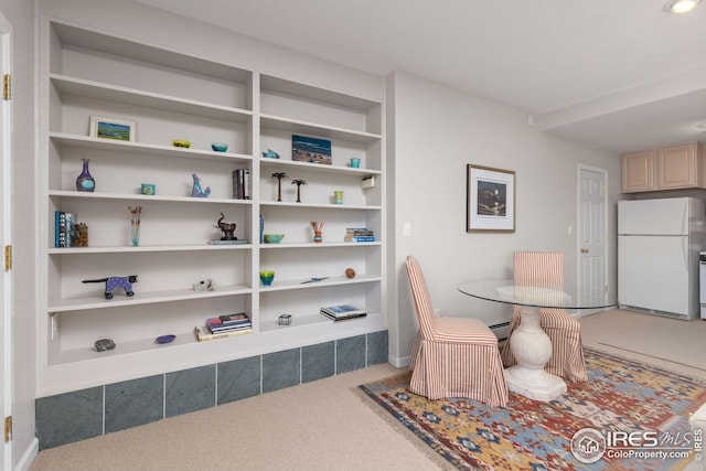 606 Sugarloaf Mountain Rd, Boulder, CO 80302 - dining room featuring carpet flooring and built in shelves