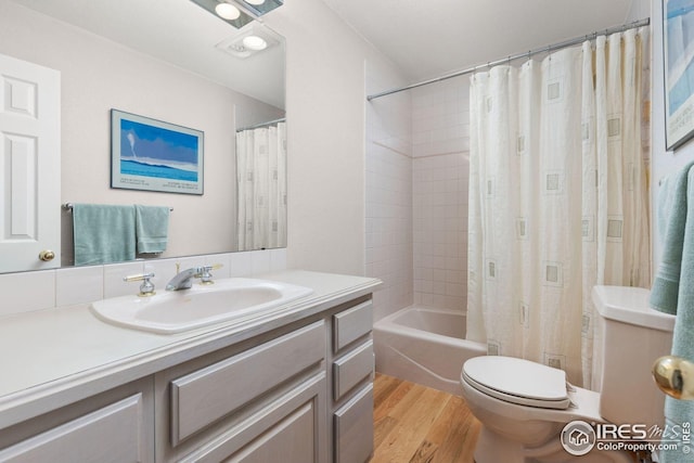 606 Sugarloaf Mountain Rd, Boulder, CO 80302 - full bathroom with vanity, wood finished floors, and shower / bath combo