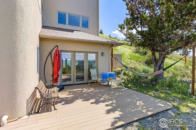606 Sugarloaf Mountain Rd, Boulder, CO 80302 - wooden terrace with french doors