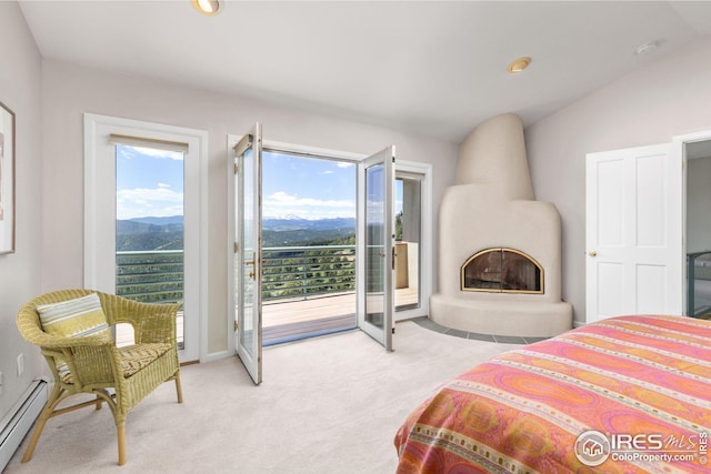 606 Sugarloaf Mountain Rd, Boulder, CO 80302 - bedroom with baseboard heating, access to exterior, carpet flooring, a mountain view, and lofted ceiling