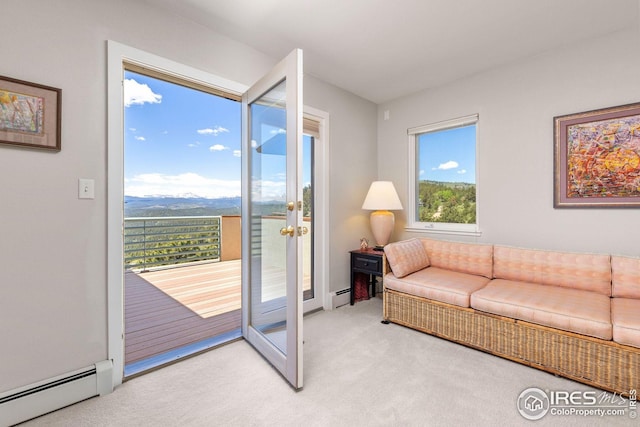 606 Sugarloaf Mountain Rd, Boulder, CO 80302 - living area featuring baseboard heating and light colored carpet