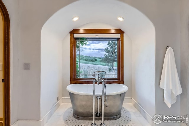 1570 County Road 37e, Lyons, CO 80540 - bathroom featuring a freestanding tub, recessed lighting, and tile patterned flooring