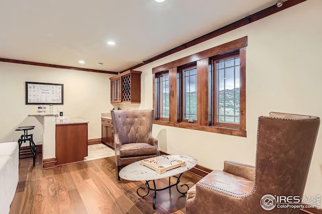1570 County Road 37e, Lyons, CO 80540 - living area featuring light wood-type flooring, recessed lighting, and crown molding