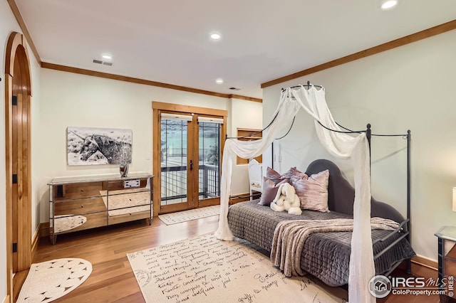 1570 County Road 37e, Lyons, CO 80540 - bedroom featuring crown molding, french doors, access to outside, recessed lighting, and wood finished floors