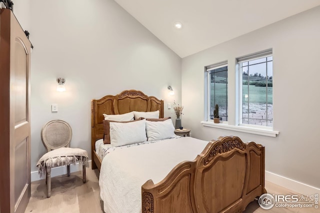 1570 County Road 37e, Lyons, CO 80540 - bedroom featuring light wood finished floors, recessed lighting, and high vaulted ceiling