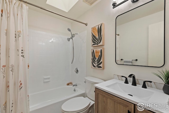 2037 Spencer St, Longmont, CO 80501 - full bathroom with a skylight, shower / bathtub combination with curtain, and vanity