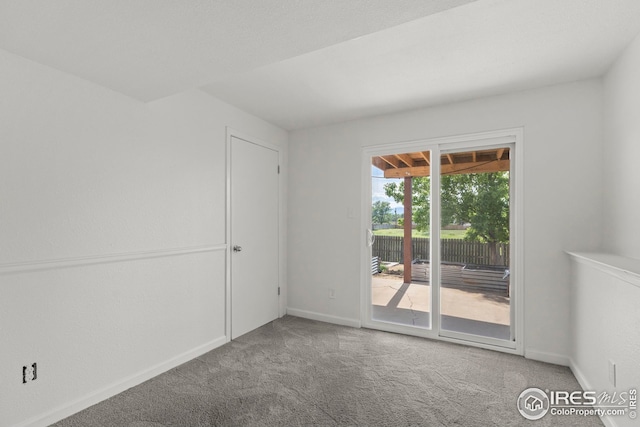 2037 Spencer St, Longmont, CO 80501 - empty room featuring carpet floors and baseboards