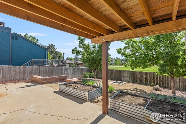 2037 Spencer St, Longmont, CO 80501 - fenced backyard featuring a garden and a patio