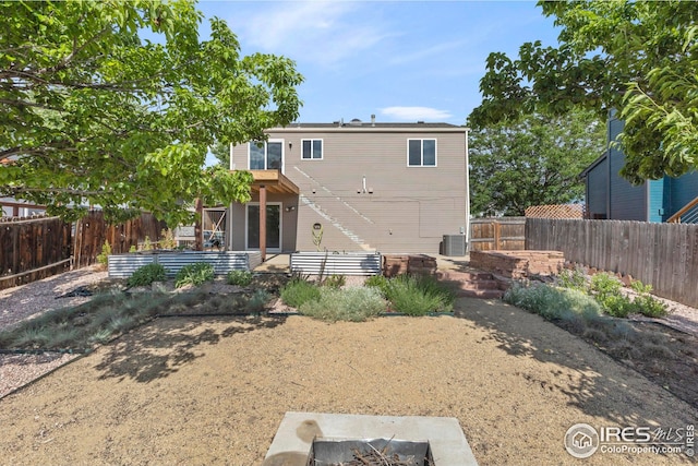 2037 Spencer St, Longmont, CO 80501 - back of house featuring a fenced backyard and a patio