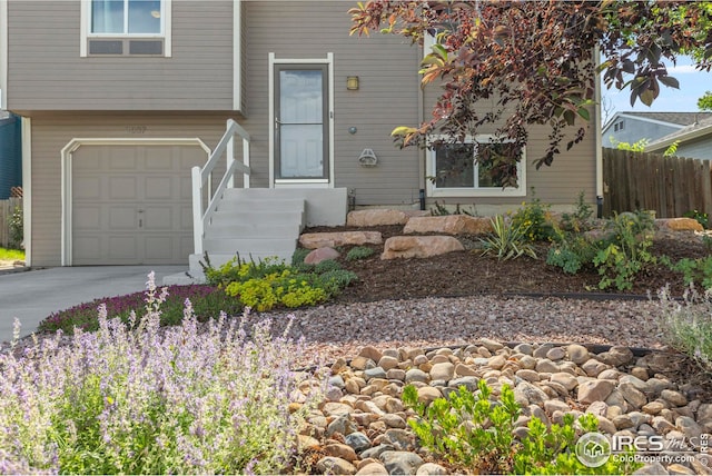 2037 Spencer St, Longmont, CO 80501 - view of front of home with a garage and driveway