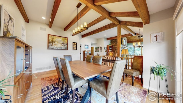 2029 Uplands Cir, Estes Park, CO 80517 - dining area featuring a chandelier, beamed ceiling, light wood-type flooring, and recessed lighting