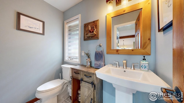 2029 Uplands Cir, Estes Park, CO 80517 - half bathroom featuring toilet and a sink