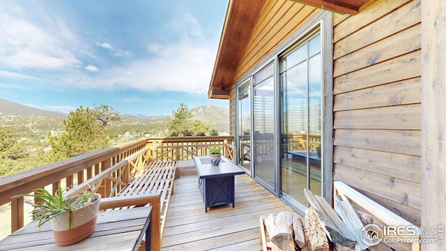 2029 Uplands Cir, Estes Park, CO 80517 - wooden terrace featuring a mountain view