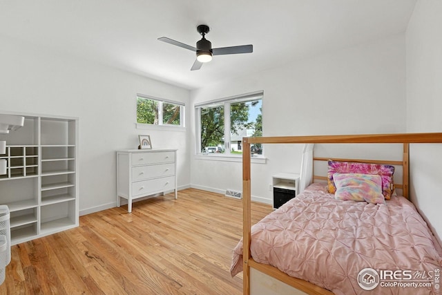 4545 Martin Dr, Boulder, CO 80305 - bedroom featuring wood finished floors and ceiling fan