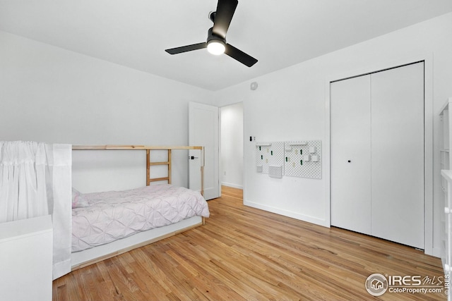 4545 Martin Dr, Boulder, CO 80305 - bedroom with wood finished floors, a closet, and a ceiling fan