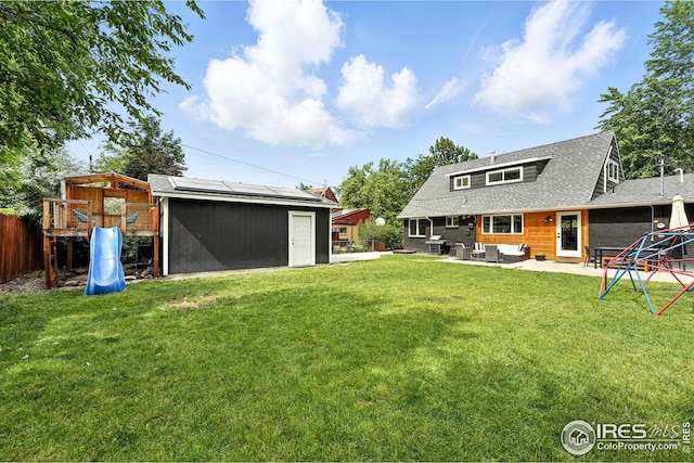 4545 Martin Dr, Boulder, CO 80305 - view of yard with a patio area, an outdoor living space, a shed, and a playground