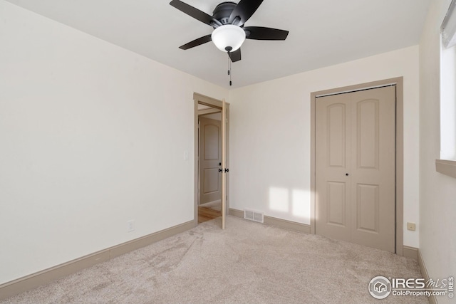 34288 County Road 59, Gill, CO 80624 - unfurnished bedroom with carpet floors, a closet, and a ceiling fan