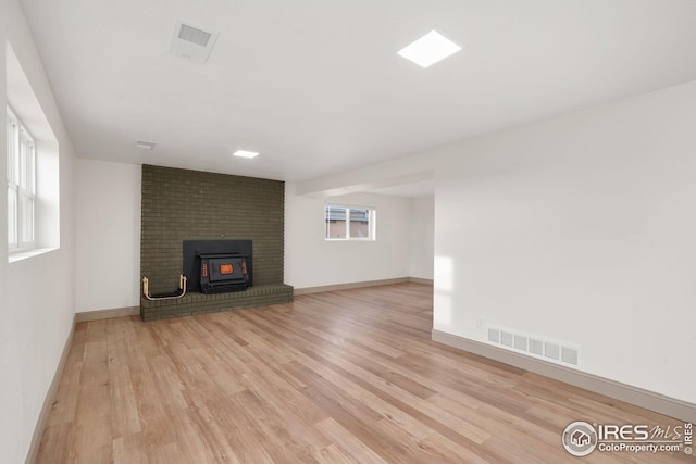 34288 County Road 59, Gill, CO 80624 - unfurnished living room featuring light wood-style flooring and baseboards