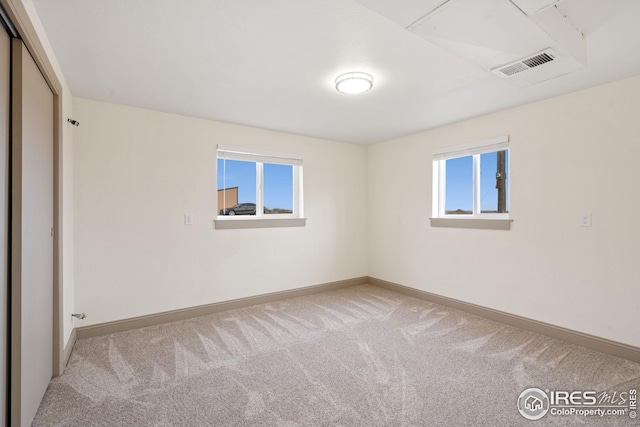 34288 County Road 59, Gill, CO 80624 - unfurnished room with carpet floors and plenty of natural light