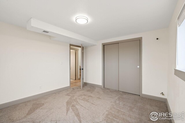 34288 County Road 59, Gill, CO 80624 - unfurnished bedroom featuring carpet flooring and a closet