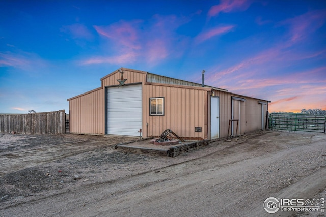 34288 County Road 59, Gill, CO 80624 - view of outdoor structure at dusk