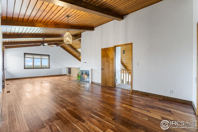 14975 US Highway 385, Julesburg, CO 80737 - unfurnished living room featuring a ceiling fan, wood finished floors, a glass covered fireplace, and wood ceiling