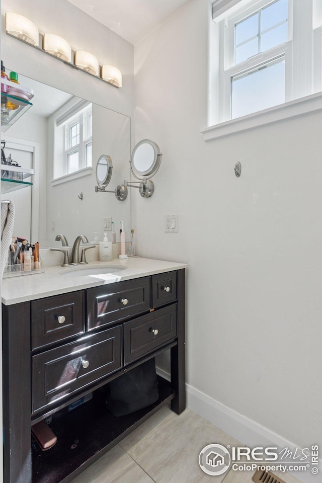 1944 Arapahoe Ave Unit A, Boulder, CO 80302 - bathroom with vanity and baseboards