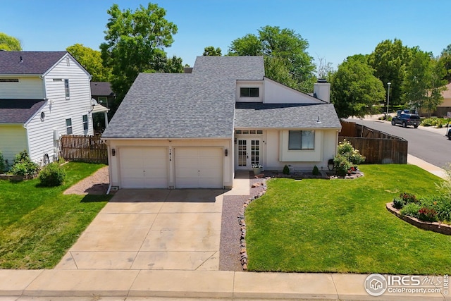 7414 Benton St, Arvada, CO 80003 - view of front of home with french doors, roof with shingles, concrete driveway, an attached garage, and a chimney