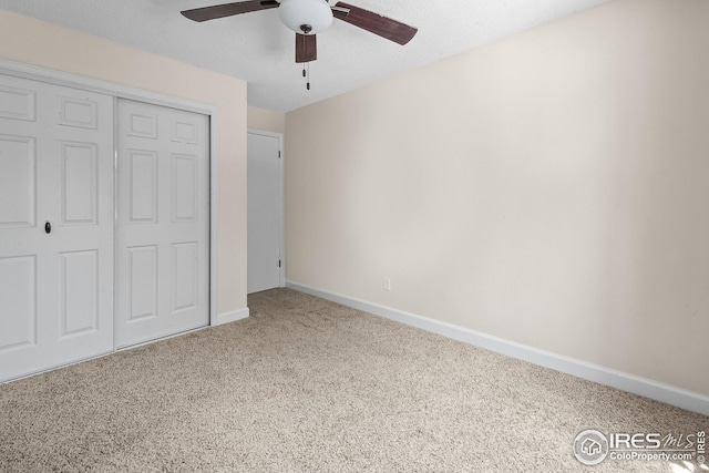 7414 Benton St, Arvada, CO 80003 - unfurnished bedroom featuring carpet flooring, a closet, and a ceiling fan