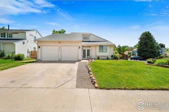 7414 Benton St, Arvada, CO 80003 - view of front of home with an attached garage, concrete driveway, a front lawn, french doors, and roof with shingles
