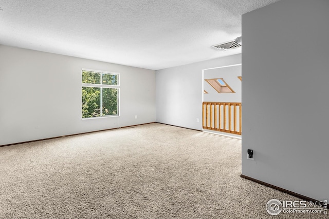 7414 Benton St, Arvada, CO 80003 - empty room with carpet and a textured ceiling