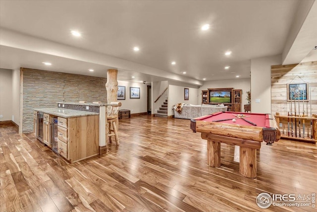 37021 Kingfisher Ct, Severance, CO 80550 - playroom with billiards, light wood-style floors, and recessed lighting