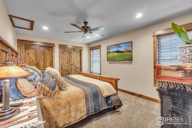 37021 Kingfisher Ct, Severance, CO 80550 - bedroom with carpet flooring, recessed lighting, a ceiling fan, and two closets