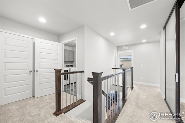 415 Stout St, Fort Collins, CO 80524 - corridor featuring an upstairs landing, light carpet, recessed lighting, and washing machine and clothes dryer