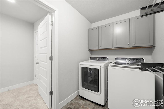 415 Stout St, Fort Collins, CO 80524 - laundry area with washing machine and dryer and cabinet space