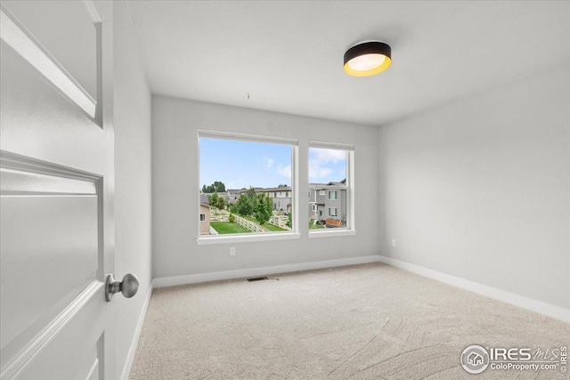 415 Stout St, Fort Collins, CO 80524 - carpeted empty room with baseboards