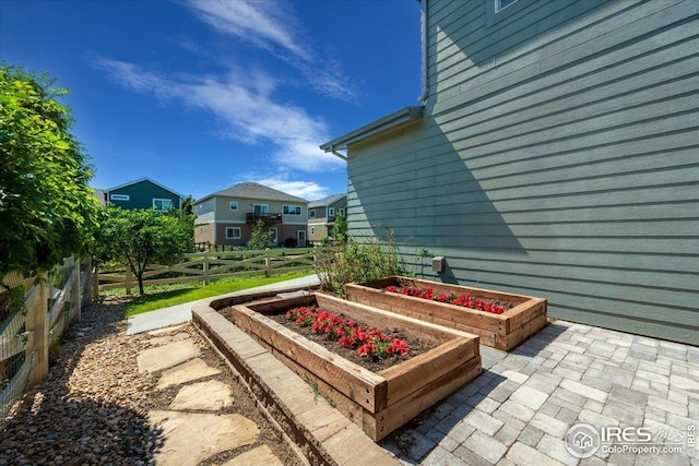 415 Stout St, Fort Collins, CO 80524 - view of patio / terrace featuring a vegetable garden