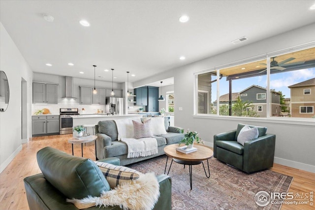 415 Stout St, Fort Collins, CO 80524 - living room featuring light wood finished floors and recessed lighting