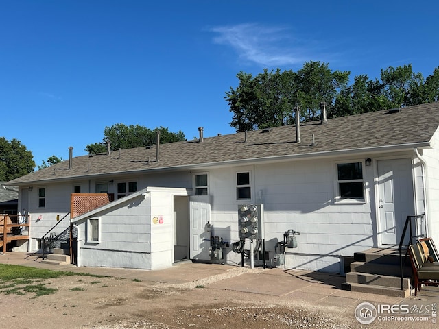 351 E 2nd St, Akron, CO 80720 - rear view of house with roof with shingles