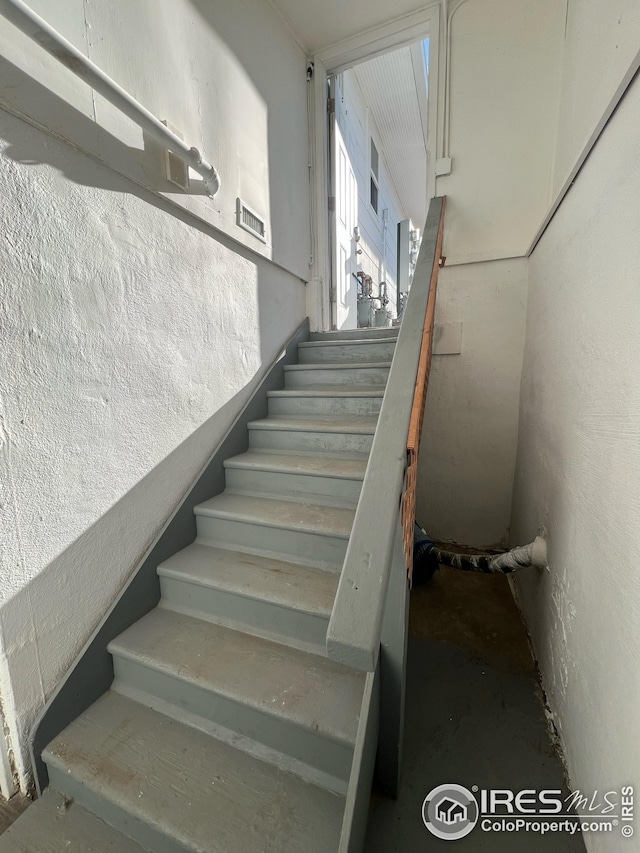 351 E 2nd St, Akron, CO 80720 - stairway with concrete floors